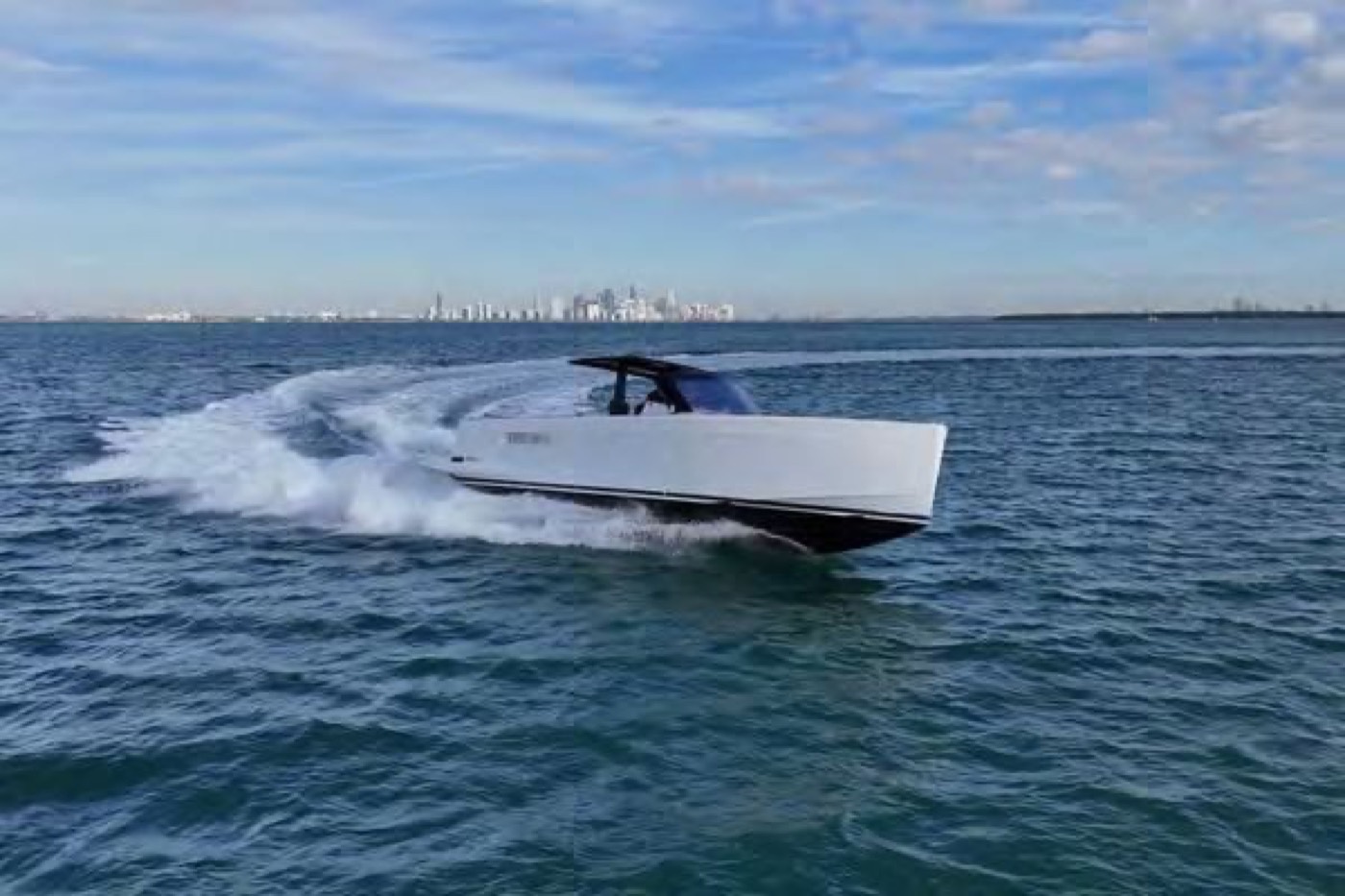 2019 Fjord 40 Open running past the Miami skyline